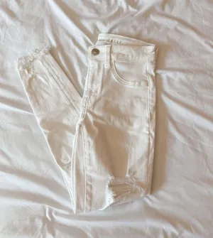 American Eagle Next Level White Distressed Hi-Rise Jeggings Size 2 Short thumbnail 1