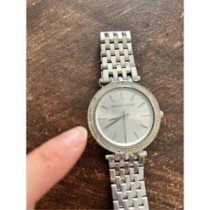 Michael Kors silver color faux diamond watch fits a small wrist 5 inches laying thumbnail 2