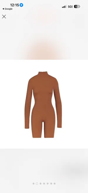 SKIMS All in One Long-Sleeve Mid Thigh Jumpsuit Onesie in Caramel new with tags thumbnail 12