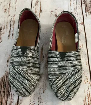 TOMS BLACK‎ WHITE SILVER METALLIC SLIP ONS thumbnail 1