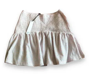 NSR STRIPE SMOCKED WAIST SKIRT IN PERI SIZE M NWT REG$35. Stretchy smocking brings comfort to a classic striped skirt that brings swishy movement to your ensemble. 15" length Elastic waist 68% polyester, 30% cotton, 2% spandex Hand wash, line dry Imported Model Stats: 5'10" height; 34" bust; 27" waist; 35" hips. thumbnail 5