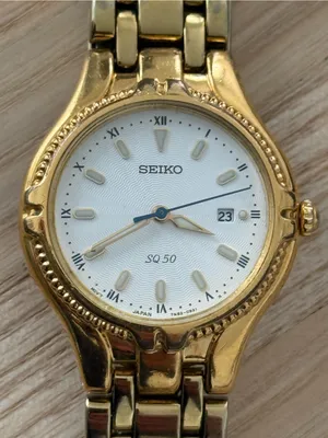 Seiko Vintage Watch Gold Bracelet Case White Dial Blue Gold Hands Date Window thumbnail 2