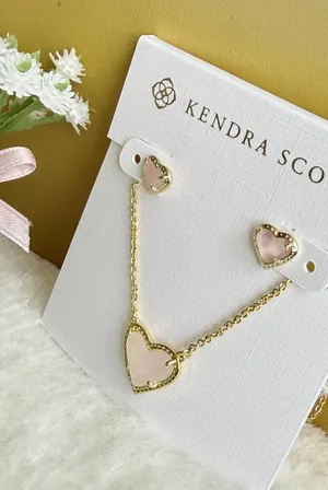 Kendra Scott Ari Heart Gold Pendant Necklace and Earrings in Rose Quartz thumbnail 1