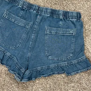 American Eagle Outfitters Women's Ruffle Denim Shorts thumbnail 10