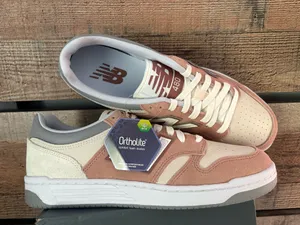 Tan and white unisex New Balance sneakers thumbnail 3