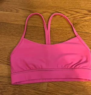 Lululemon Sonic Pink Flow Y Sports Bra thumbnail 1