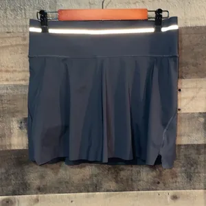 Athleta Ace Black Tennis Skort with silver reflective stripe on waistband thumbnail 3