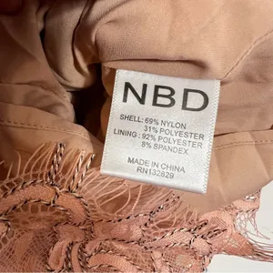 NBD Revolve Secrets Revealed Lace Asymmetrical Romper in Dusty Rose Sz XS thumbnail 11