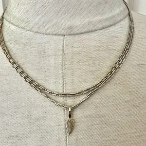 Long gold tone double chain small leaf pendant thumbnail 1