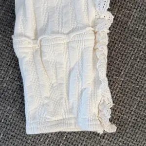 White Ruffled Women's knit top by Free People “More Romance” white medium thumbnail 5