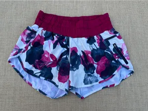 Lululemon Floral Red Burdeos Track That High Rise Running Shorts Zip Pocket Sz 8 thumbnail 1