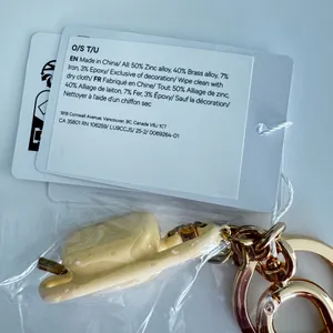 Lululemon Everywhere Belt Bag Key Charm Butter Cream/Gold Key Charm thumbnail 9