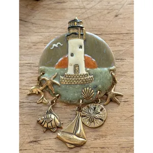 Lighthouse-Themed Enamel Brooch With Nautical Charms & Gold Accents Measures App thumbnail 4