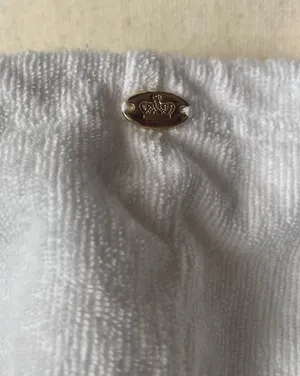 JUICY COUTURE-WHITE ZIP FRONT HOODIE-WOMENS SIZE SMALL Cozy white hooded zip-up jacket with drawstrings. Perfect for casual wear, 3/4 sleeves, gold hardware, J zipper pull, 100% cotton, has stretch, excellent condition Measurements: Bust: armpit to armpit 23-25 inches Length: shoulder seam to bottom 20 inches thumbnail 5