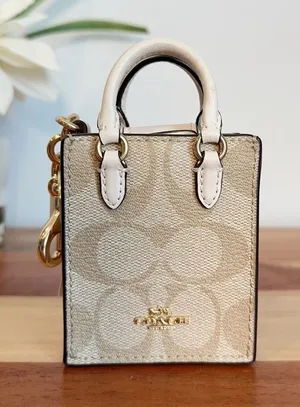 NWT Coach‎ North/South Mini Tote Bag Charm In Signature Canvas thumbnail 1