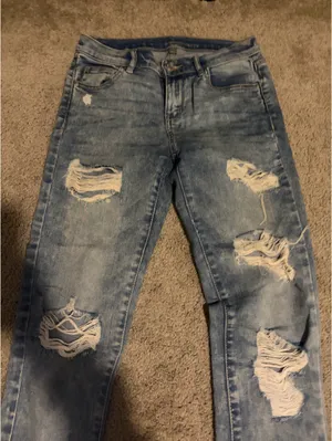 High waisted light wash ripped jeans thumbnail 2