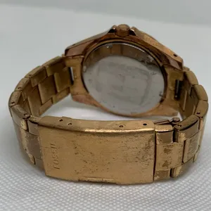 Fossil women watch ES-2811 day date hours rose gold tone 38mm size 6.5” running thumbnail 4