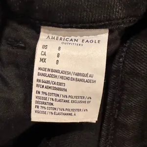 American Eagle High waisted distressed black‎ denim jean shorts Women's 8 thumbnail 2
