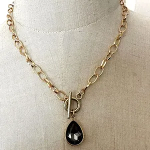 Gold tone grey rhinestone teardrop pendant necklace thumbnail 1