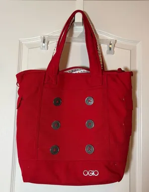 OGIO RED BAG WITH POLKA DOTS 14” X 14”. Preloved thumbnail 1