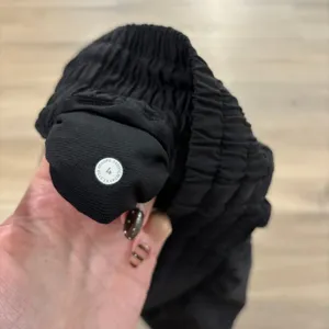 Lululemon Hotty Hot Short High-Rise Long 4" Women Size 4 Black thumbnail 2