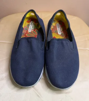 Skechers Kids Slip-On Sneakers in Navy with Yellow Liner thumbnail 1