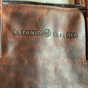 Antonio Valeria is a former Spacious Brown Leather Tote with Minimalist Design thumbnail 2