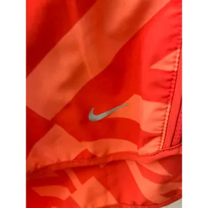 Nike Dri-FIT Women’s Medium Coral Print Lined Running Athletic Shorts thumbnail 4