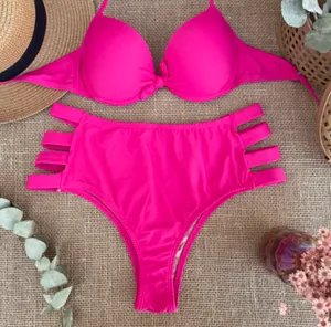 Make a splash with this vibrant pink bikini set. Perfect for a day at the beach or lounging by the pool. thumbnail 1