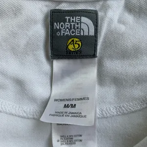 North Face A5 series white Women’s medium short sleeve polo shirt thumbnail 2