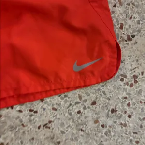 NWT Nike dri fit running shorts XXL orange thumbnail 2