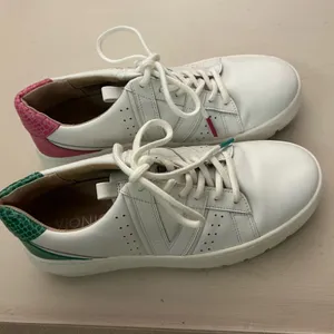 Sneakers White Leather Women's Sneakers with Green Heel Accent 6 by Vionic thumbnail 10