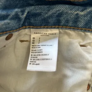 American Eagle Outfitters Light Blue Distressed Denim Shorts thumbnail 6