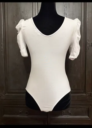 Vylette White bodysuit with Puffy Sleeves - Size Medium. ***refer to measurements. Super Cute top gentle worn and in excellent condition. Cotton/ spandex material. Measurements approximately for the bodysuit/ 14” from armpit to armpit x 25” from shoulder to snaps in crotch. Non-smoking home. Priced to sell at as is condition. Don’t like my price please make reasonable offer. thumbnail 5