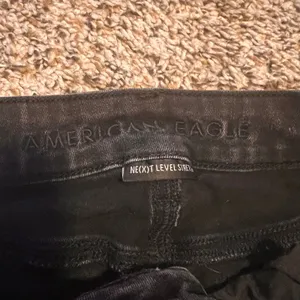 American Eagle Women's Black Wash‎ Next Level Stretch Legging Jeans thumbnail 2