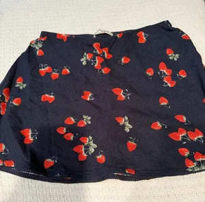 Abercrombie & Fitch Navy Mini Skirt with Red Strawberry Print thumbnail 1