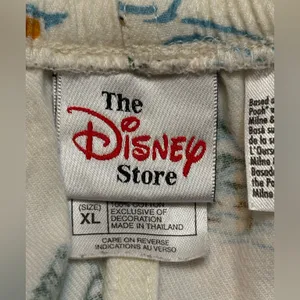 Disney Winnie the Pooh size extra large pajama pants with a cute winter scene. thumbnail 3