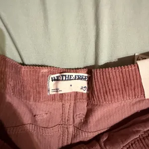 We The Free Ribbed-Waist Corduroy Pants in Dusty Rose thumbnail 3
