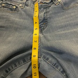 Vintage Levi's® Perfectly Slimming Boot Cut 512 Jeans W30 X L27 Blue Light Wash thumbnail 7