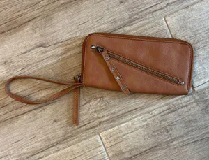 Free People Distressed Vegan Wristlet Wallet With Arm Straps. thumbnail 1