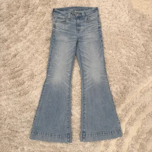 American Eagle High Rise Flare | 70s Inspired Denim thumbnail 7