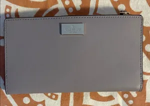 kate spade lilac zip-around wallet with metal logo thumbnail 1