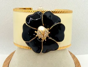 Stella & Dot Kelly Black Enamel Flower Ladybug Cuff Bracelet thumbnail 1