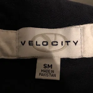 vintage velocity black polo golf tee thumbnail 4