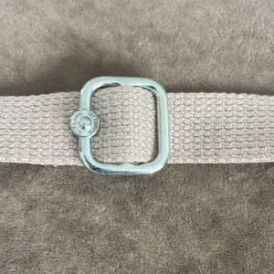 Kipling crossbody purse. Adjustable strap. Flap over closure w/ snap. Light pink thumbnail 3