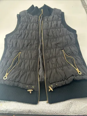Calvin Klein Women’s Black Quilted Puffer Vest with Gold Accents bust bust 32 length 23 thumbnail 1