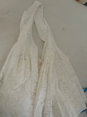 peekskill brand Chic Zimmermann mini dress in cream lace. Features a halter neckline and button details. Ideal for elegant occasions thumbnail 5