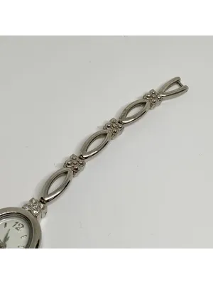 Silver tone women’s quartz analog watch 19mm oval white dial rhinestones running thumbnail 4