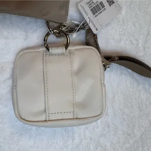 Dual pouch sling bag in beige by Lululemon thumbnail 3
