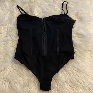 Free People Bodysuit size L color black adjustable stripes please see all photos thumbnail 9